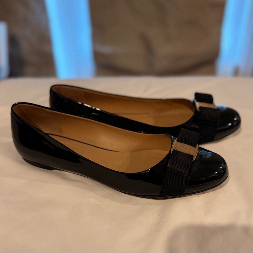 Salvatore Ferragamo black patent flats. 9 B